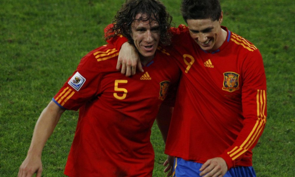 Carles Puyol i Fernando Torres